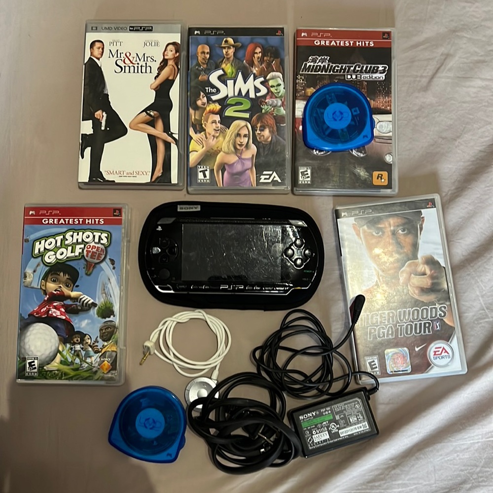 PSP w/ 6 games and charger and headset converter